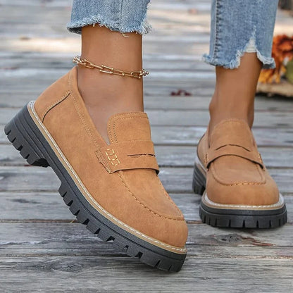 Trendy women's platform loafers with a chunky sole, comfortable for casual and dress wear.