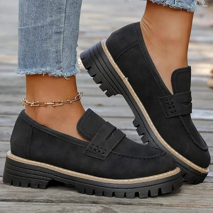 Elegant women's platform loafers, a chunky and comfortable slip-on shoe for dress occasions.
