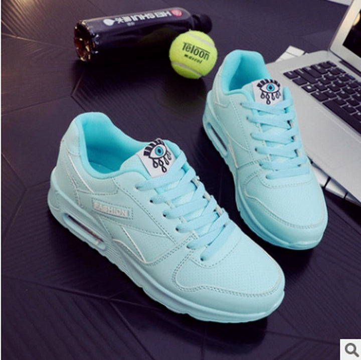 Women's chunky platform sneakers in vegan leather. Stylish, comfortable everyday footwear for modern fashion.