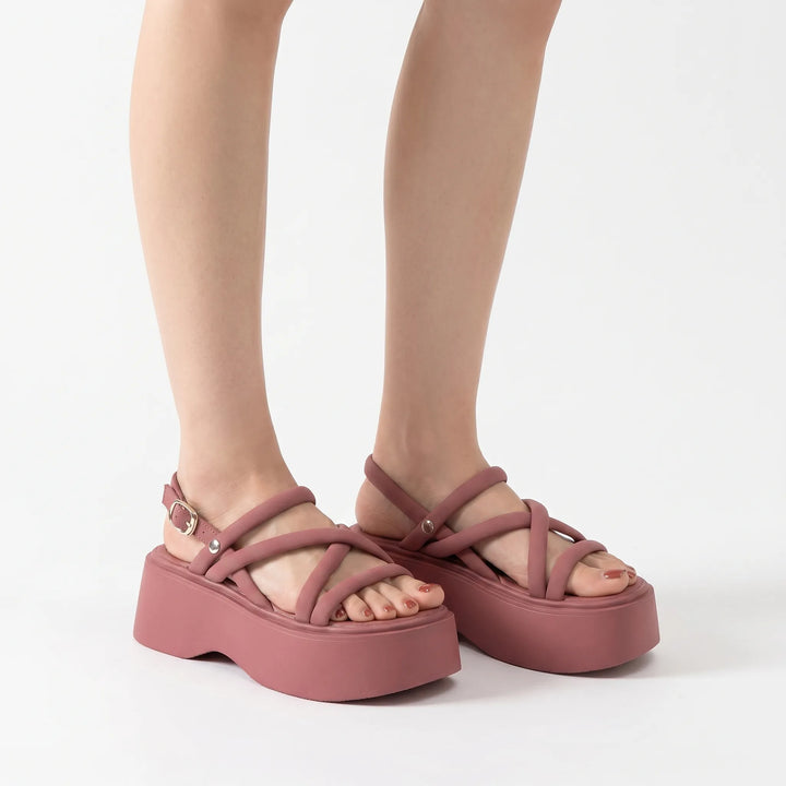 Chunky platform wedge sandals for women, featuring a comfortable open toe and stylish criss-cross design, perfect for summer.