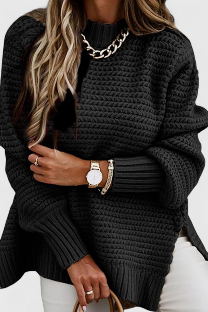 Oversized women's chunky ribbed sweater. Comfortable mock neck, ideal for cold weather & casual style.