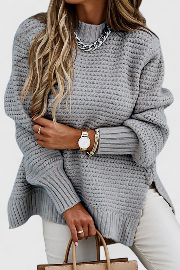 Warm women's fall sweater. Chunky ribbed knit with a mock neck, perfect for cozy winter fashion.