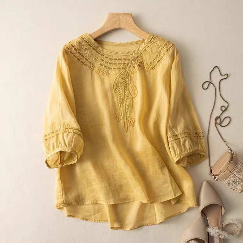 Women's Claire embroidered flowy blouse in a relaxed fit, perfect for elegant casual spring & summer wear.