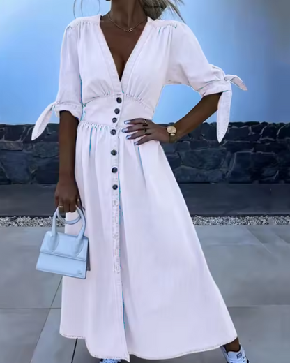 Versatile women's short sleeve button dress, offering classic style and comfortable everyday wear.
