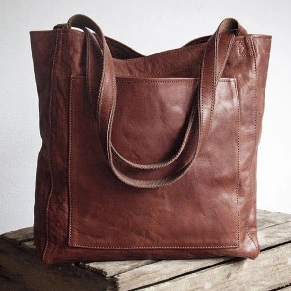 Versatile women's shoulder tote bag, ideal for work, travel, and daily essentials. Features organized, classic design.