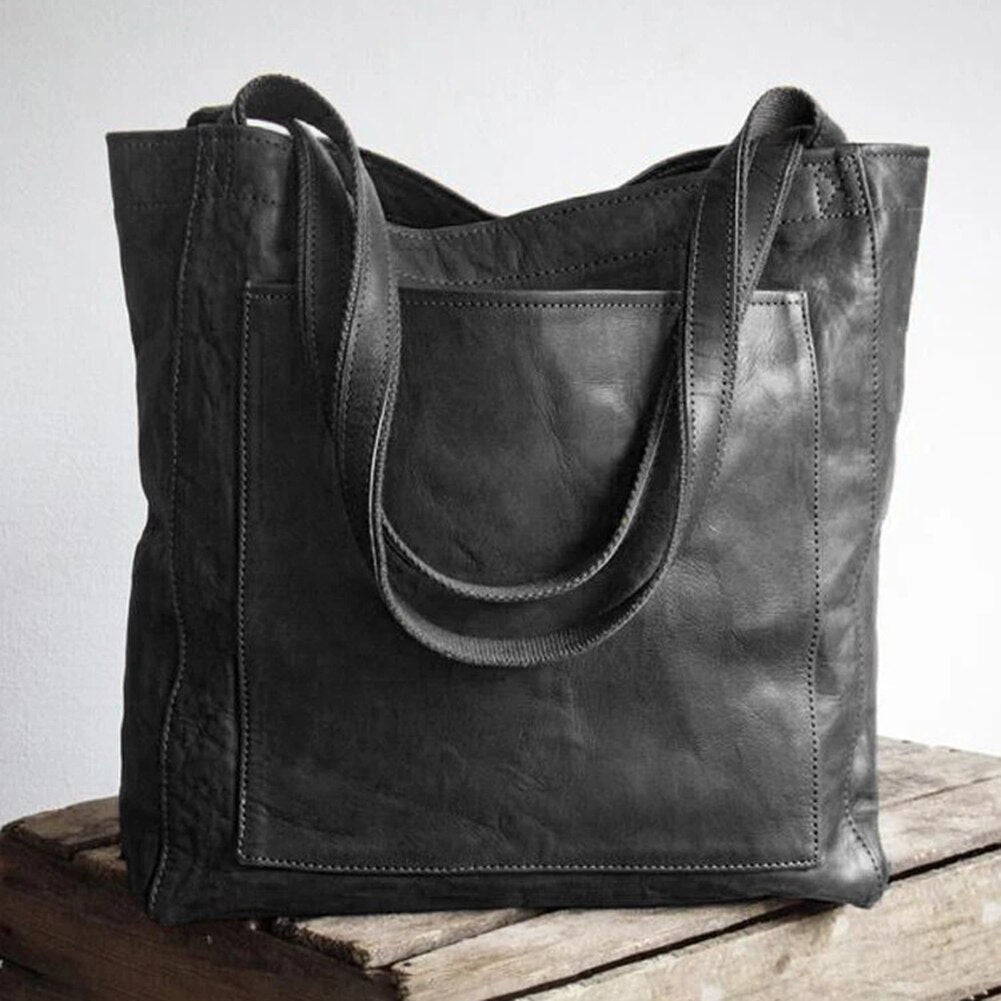 Stylish women's effortless everyday tote bag. Classic design, perfect as a shoulder bag for work or travel.