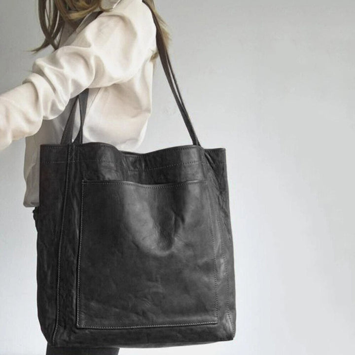 Daily essential women's shoulder tote bag. Classic, versatile design for work, travel & everyday use. Effortless style.