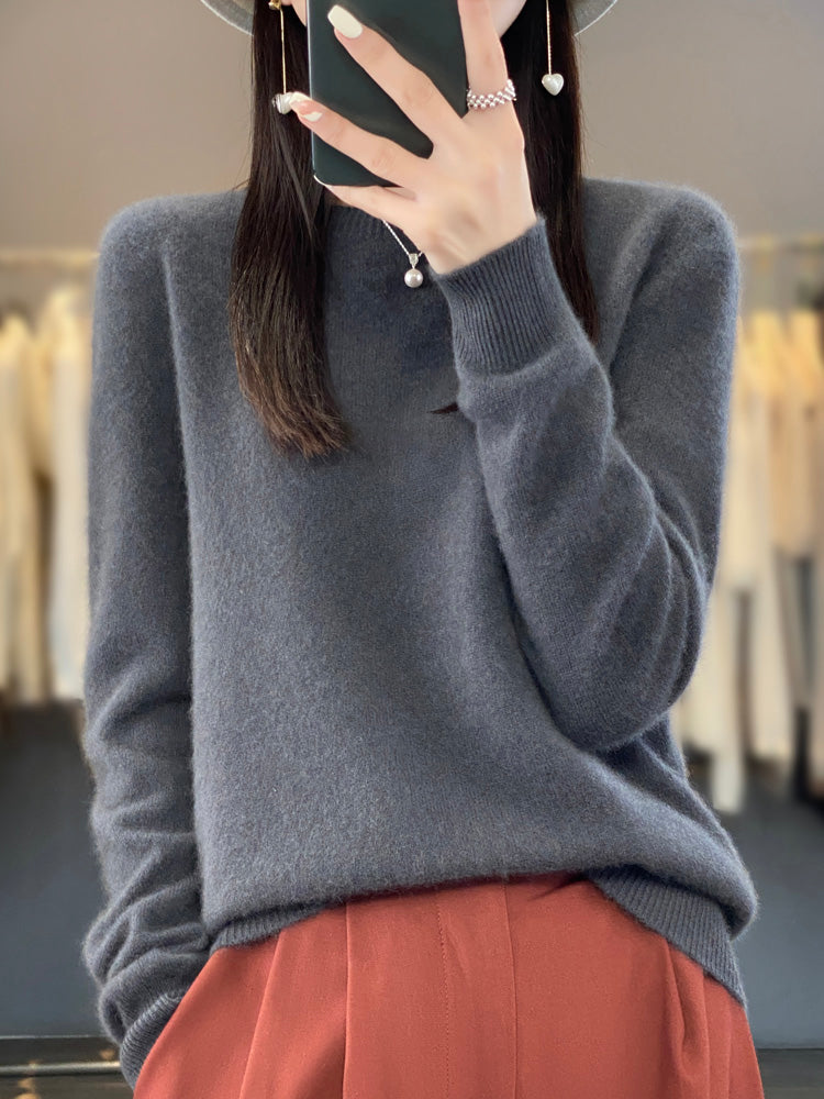 Relaxed fit women's round neck pullover, long sleeve, comfortable for all-day wear.