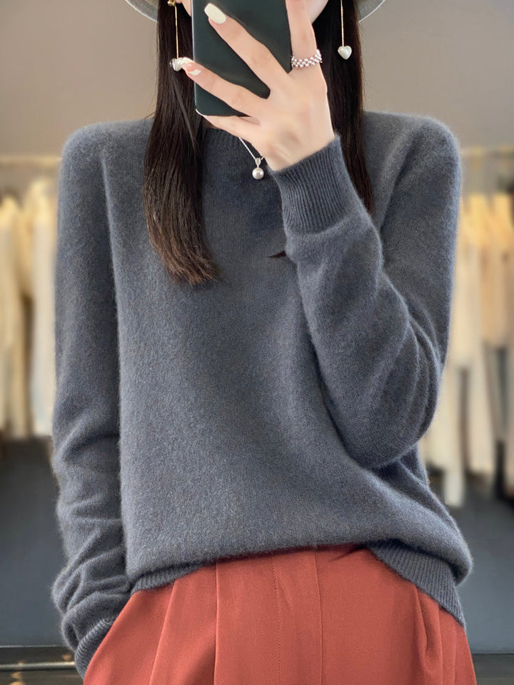 Relaxed fit women's round neck pullover, long sleeve, comfortable for all-day wear.