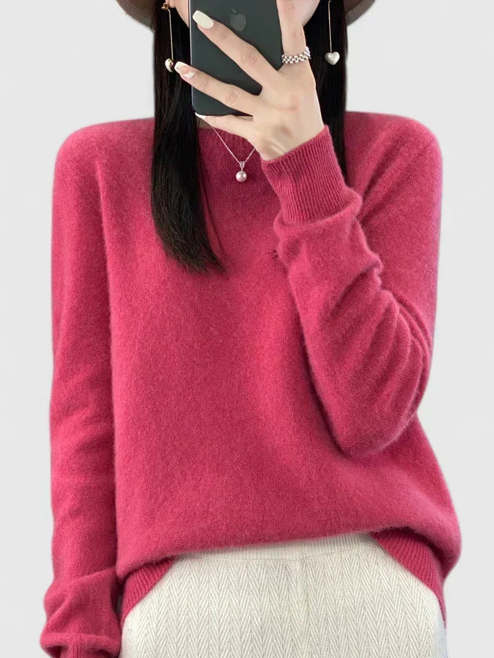 Women's knit round neck pullover, long sleeve, perfect for layering during colder months.