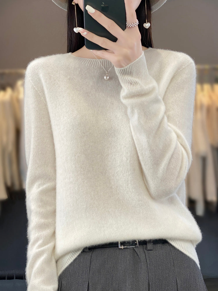Winter essential: women's long sleeve round neck sweater, comfortable and classic design.