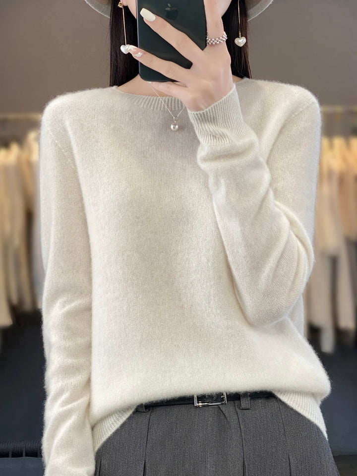 Winter essential: women's long sleeve round neck sweater, comfortable and classic design.