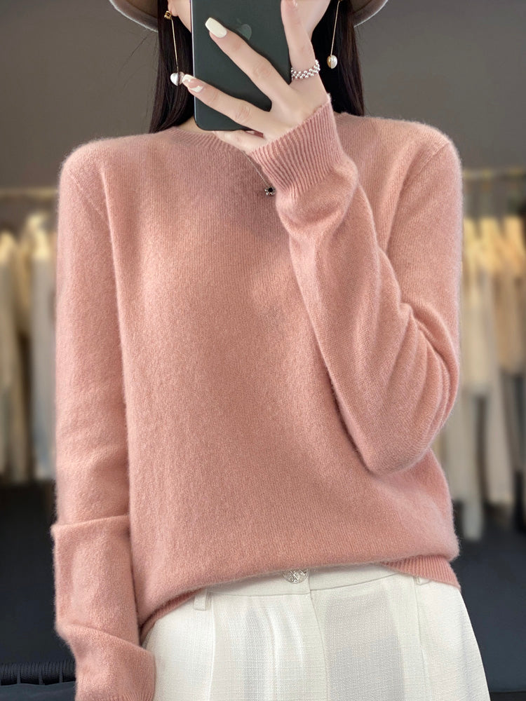 Side profile of a comfortable women's round neck pullover, long sleeve, soft fabric.