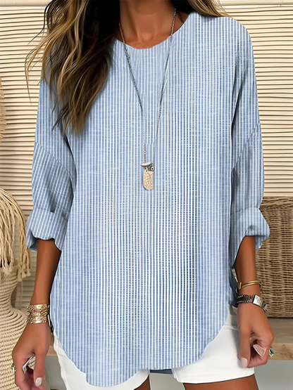 Women's classic striped blouse in blue, long sleeve with roll-up tabs. Relaxed fit for versatile spring/summer casual wear.