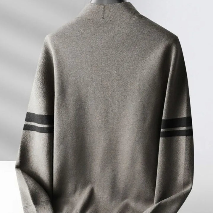 Chic women's striped knit cardigan. Cozy long sleeve style offers comfort and a classic look for versatile layering.