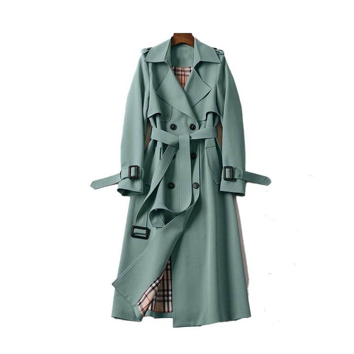 Sophisticated women's trench coat, tailored and long, offering elegant fashion & outerwear for women.