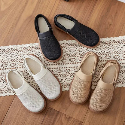 Pair of Cloudra women's breathable clogs, cushioned and lightweight for comfortable, casual walking.