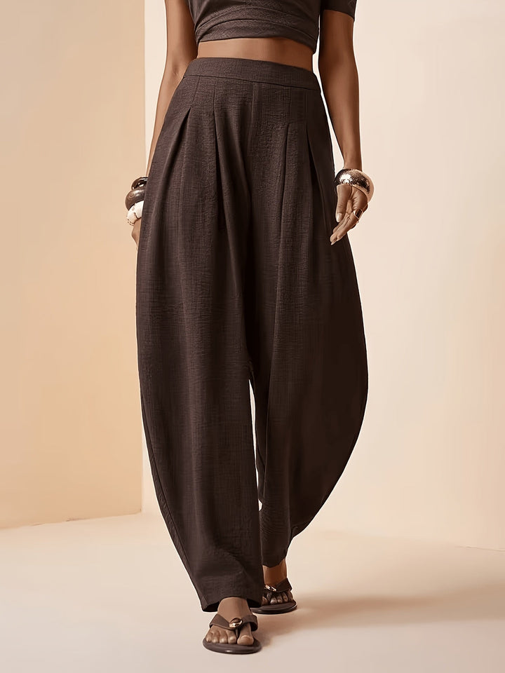 Women's coffee brown high-waist harem pants with tapered ankle, perfect for casual wear and comfortable style.
