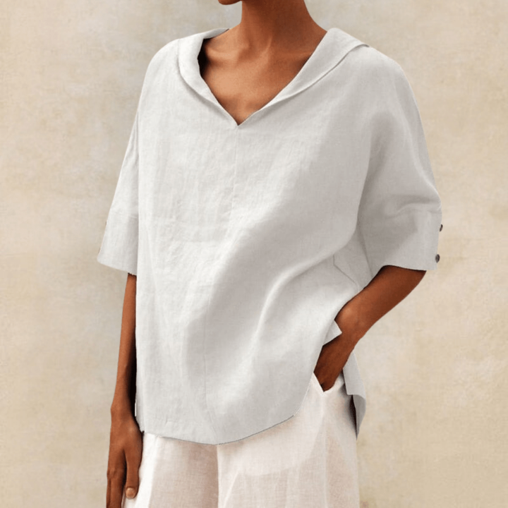 Chic women's collared V-neck tunic top, showcasing effortless style, comfort & a relaxed fit for daily wear.