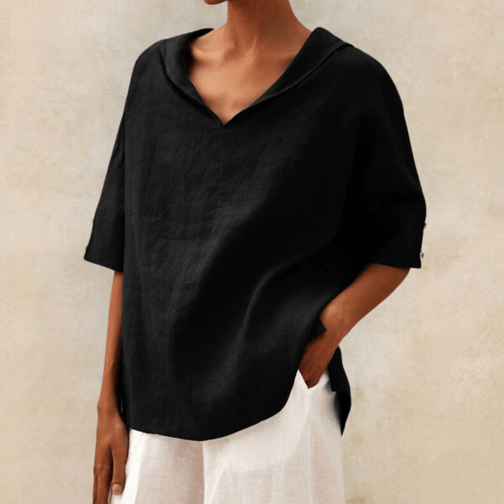 Casual women's V-neck collared tunic, offering a relaxed fit & comfort. Perfect for stylish spring/summer outfits.