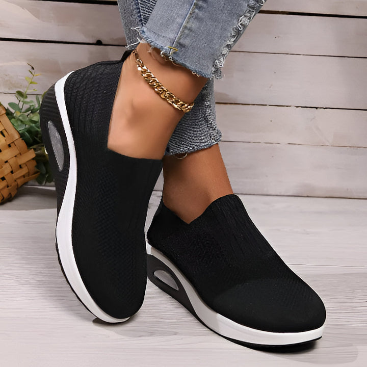Non-slip women's walking sneakers, designed for comfort, support, and lightweight athletic style.