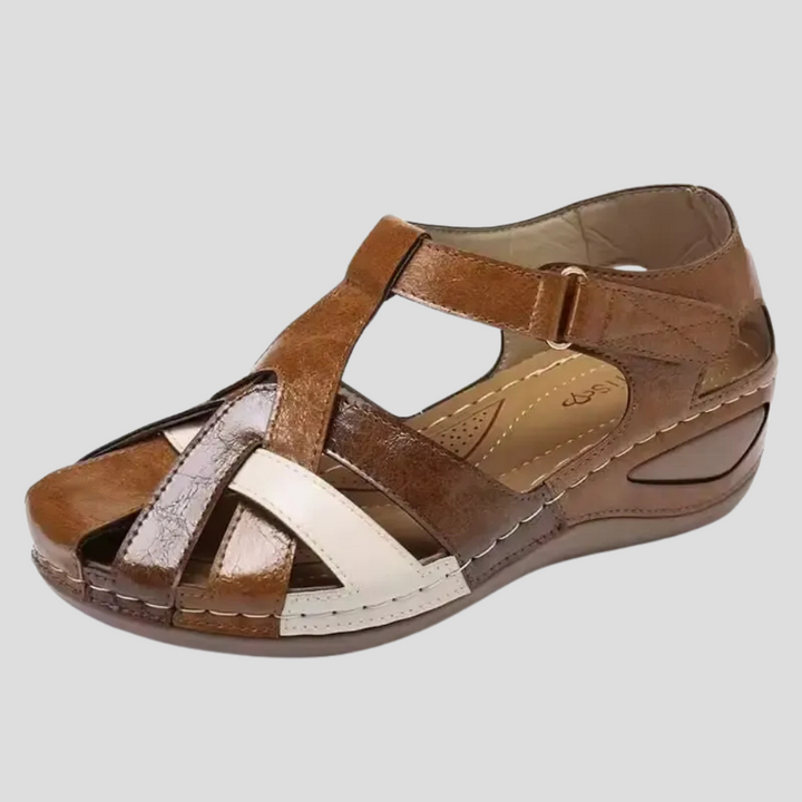 Orthopedic women's slip-on sandals with arch support for daily wear comfort.