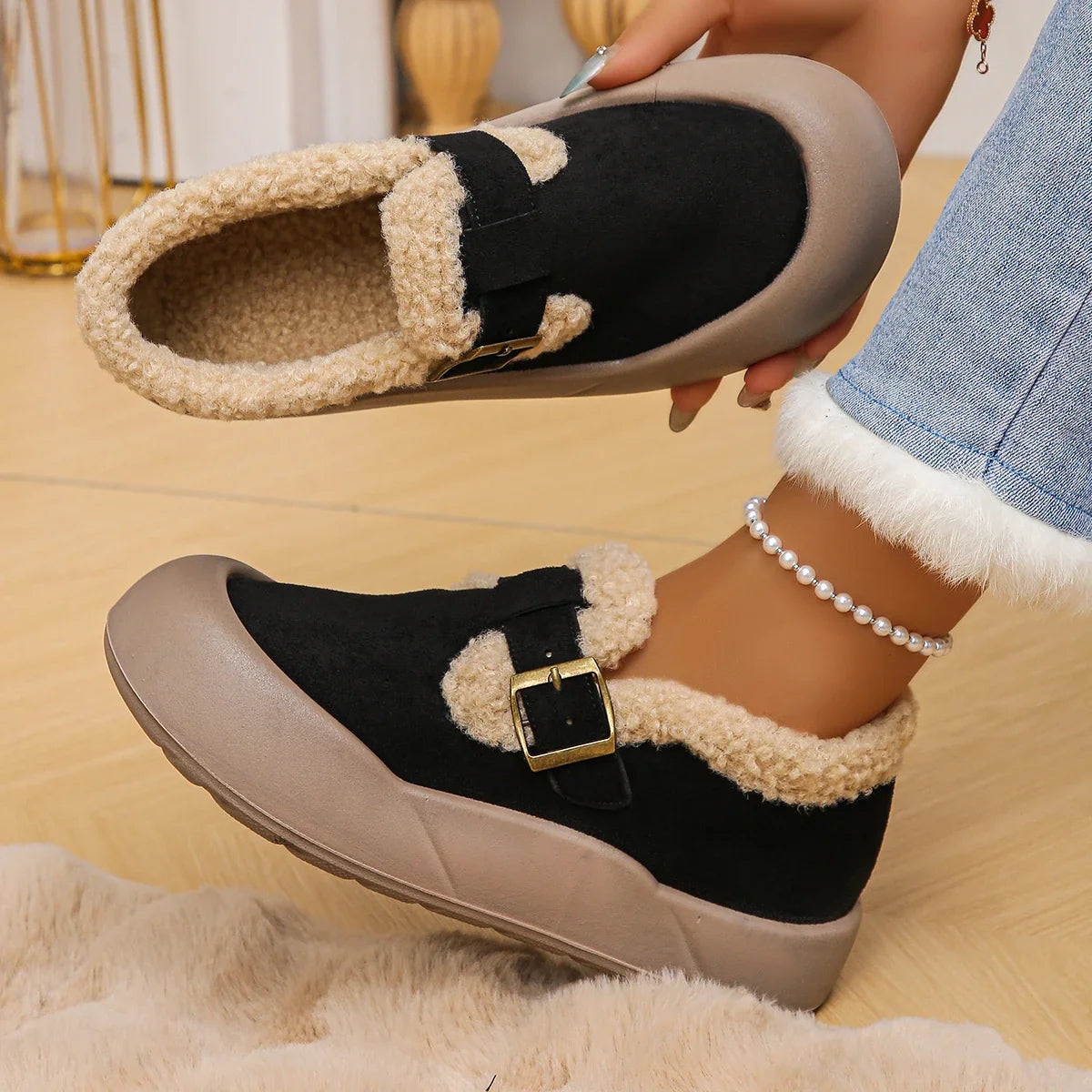 Fashionable women's clogs: cozy, warm, and comfortable slip-ons with a distinctive buckle.