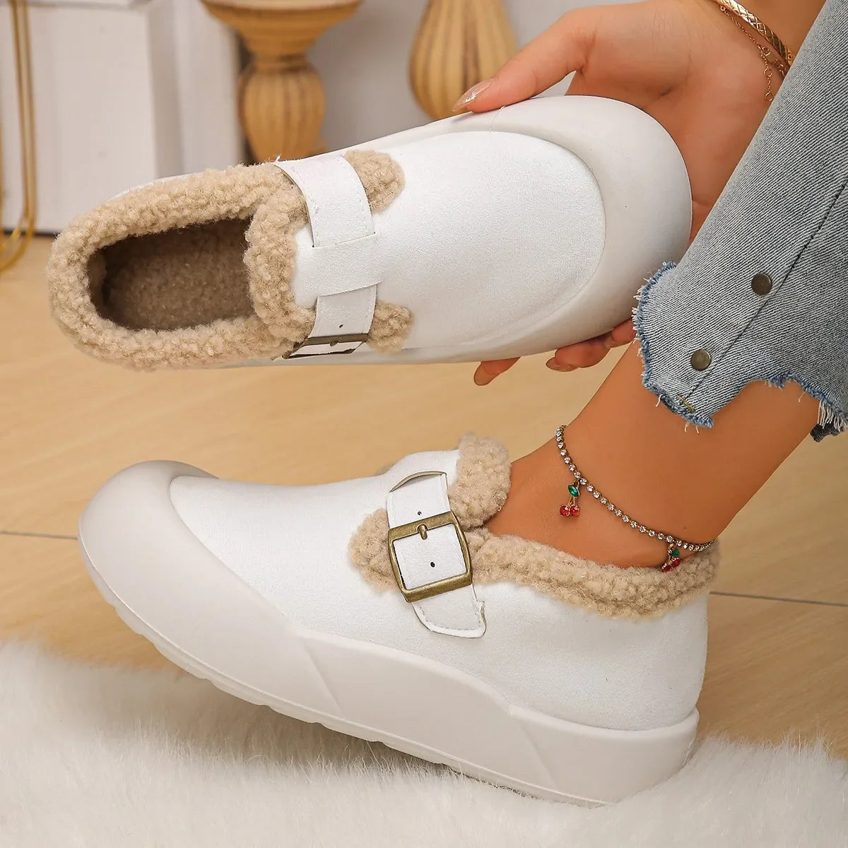 Soft, cozy slip-on women's clogs with an elegant buckle; warm winter comfort footwear.