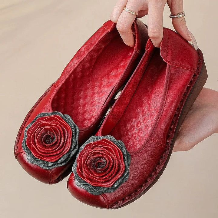 Everyday women's shoes: comfort slip-on loafers with charming floral appliqué, blending style and ease.
