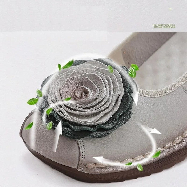 Women's floral appliqué loafers, a perfect slip-on comfort footwear choice for a chic and relaxed look.