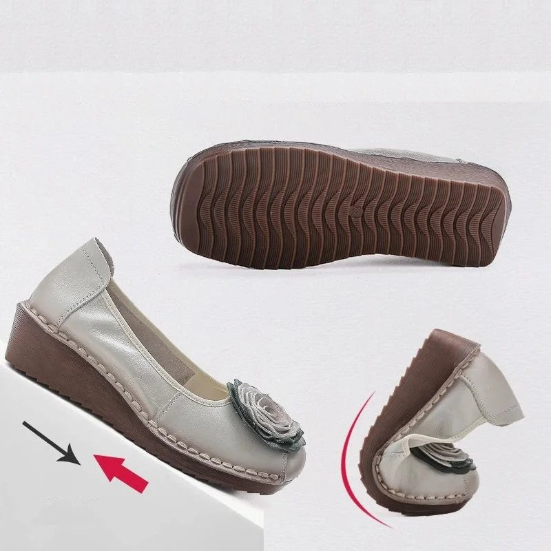 Close-up of the delicate floral appliqué on women's comfort slip-on loafers, highlighting intricate craftsmanship.