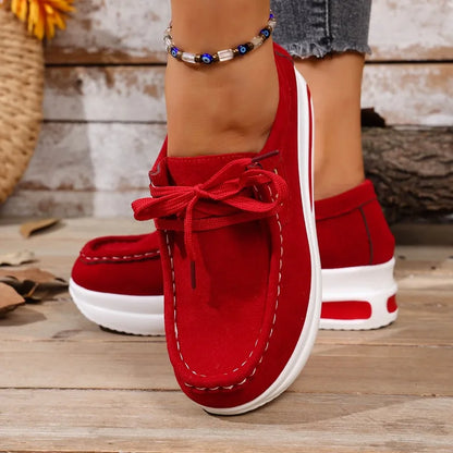 Lightweight women's walking shoes with orthopedic cushioning and shock-absorbing soles.