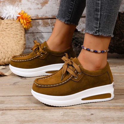 Side view: Cushioned women's walking shoes, highlighting platform sole & shock absorption.
