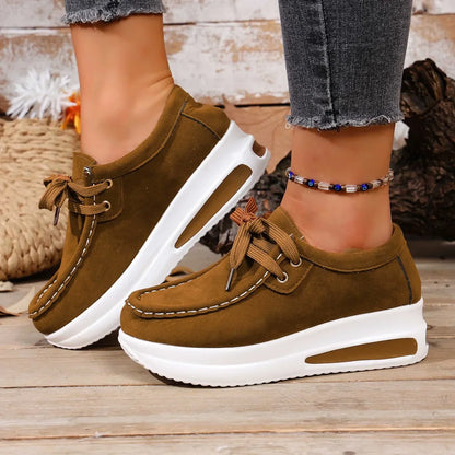 Close-up of women's orthopedic comfort walkers, breathable upper and secure lace-up fit.