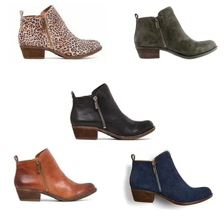 Sleek women's ankle boots with sturdy block heel, convenient side zip, and elegant rounded toe for winter style.