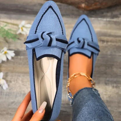 Stylish women's ballet flats with a comfortable fit, arch support, and trendy twisted toe design.