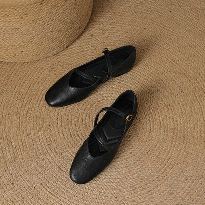 Closed-toe women's flats featuring an adjustable strap, designed for ultimate comfort & everyday style.