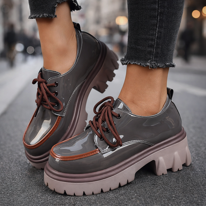 Women's comfortable black lug sole platform shoes for casual everyday wear.