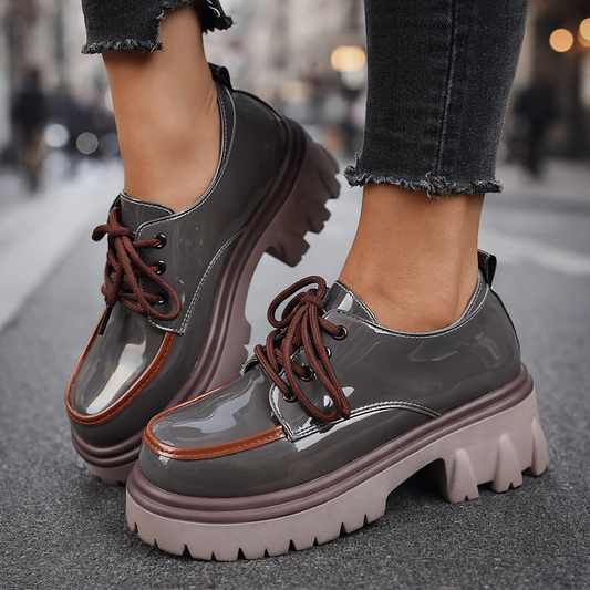 Women's comfortable black lug sole platform shoes for casual everyday wear.
