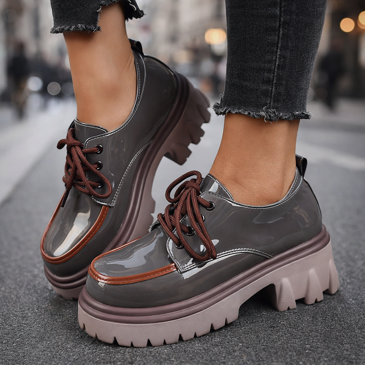 Women's comfortable black lug sole platform shoes for casual everyday wear.