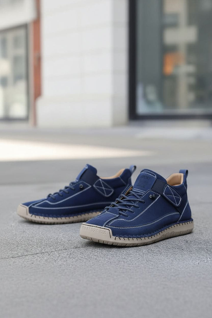 Stylish navy blue women's slip-on trainers, ideal for casual wear, walking, and daily errands.
