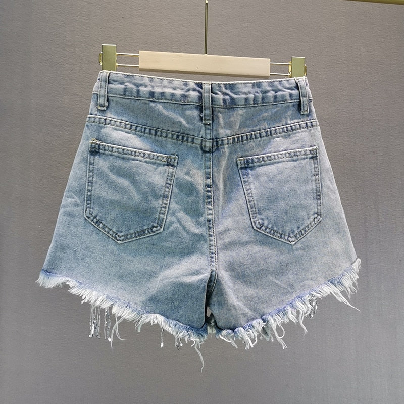Fashionable women's blue shorts, offering everyday comfort & style for summer casual wear and versatile activities.