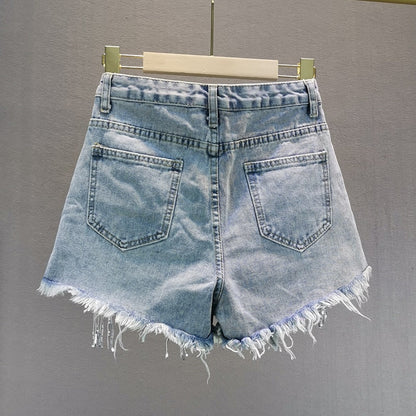 Fashionable women's blue shorts, offering everyday comfort & style for summer casual wear and versatile activities.