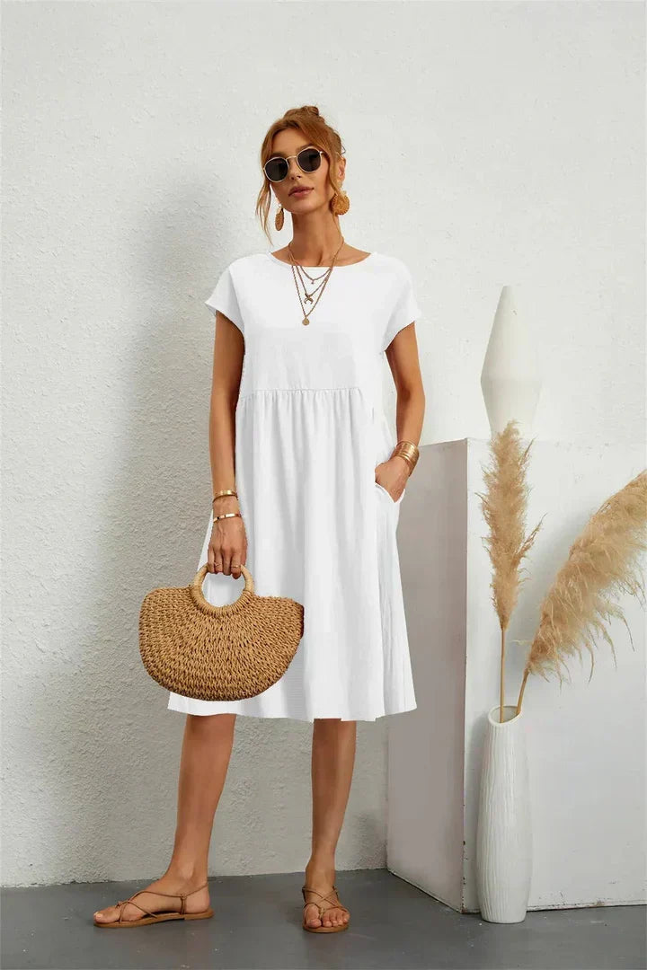 Soft women's casual pocket dress, perfect for relaxed summer days and effortless style.