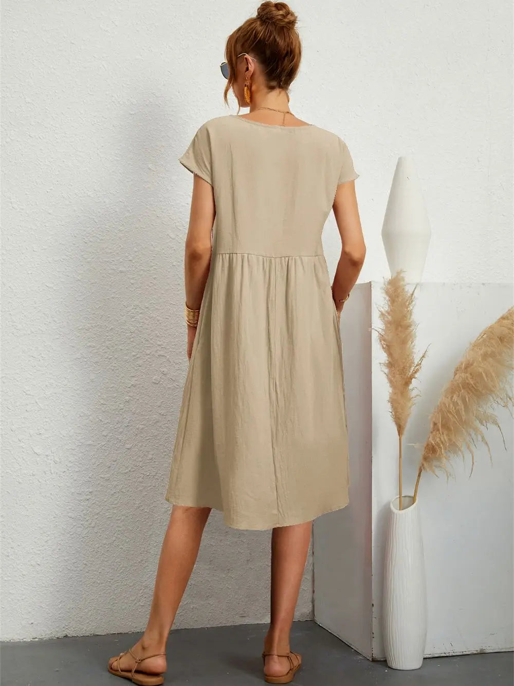 Chic women's relaxed fit summer pocket dress, versatile for any casual occasion with ultimate comfort.