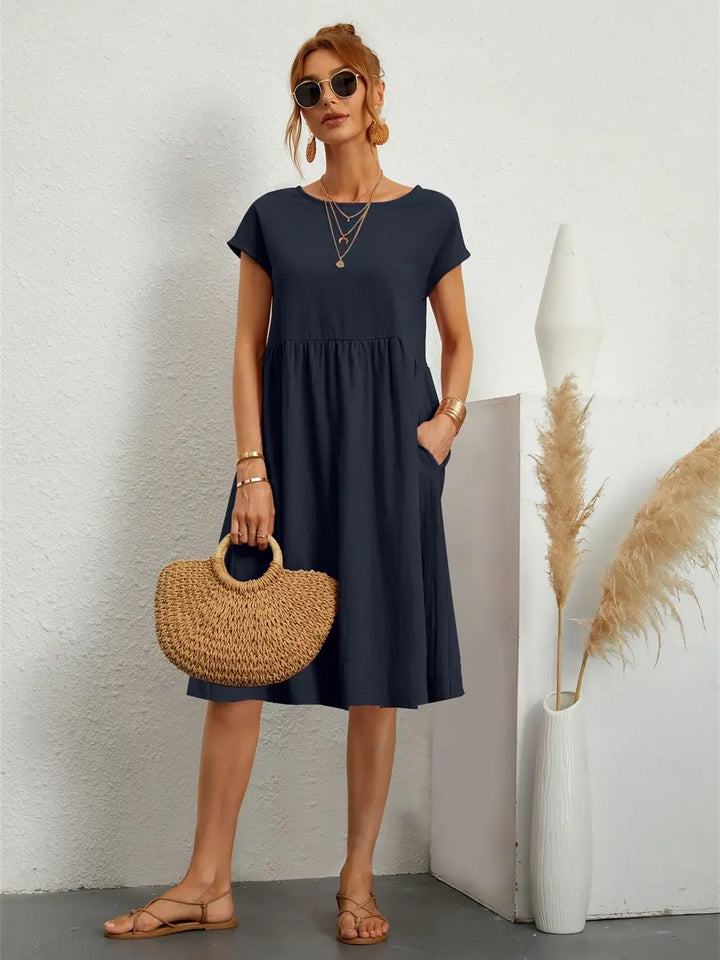 Effortless women's casual pocket dress, offering ultimate comfort and a stylish relaxed fit.