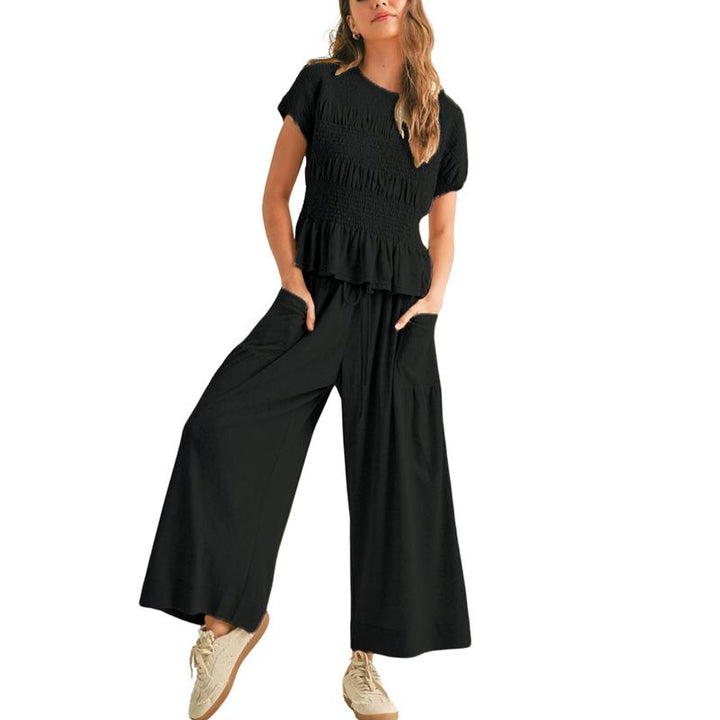Women's comfortable cotton blend smocked two-piece set with wide-leg pants. Casual, elegant loungewear.