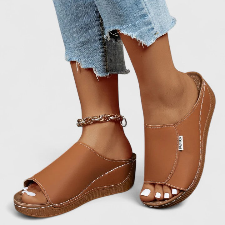 Elegant women's open-toe sandals, offering superior comfort for summer & everyday casual wear. Stylish footwear.