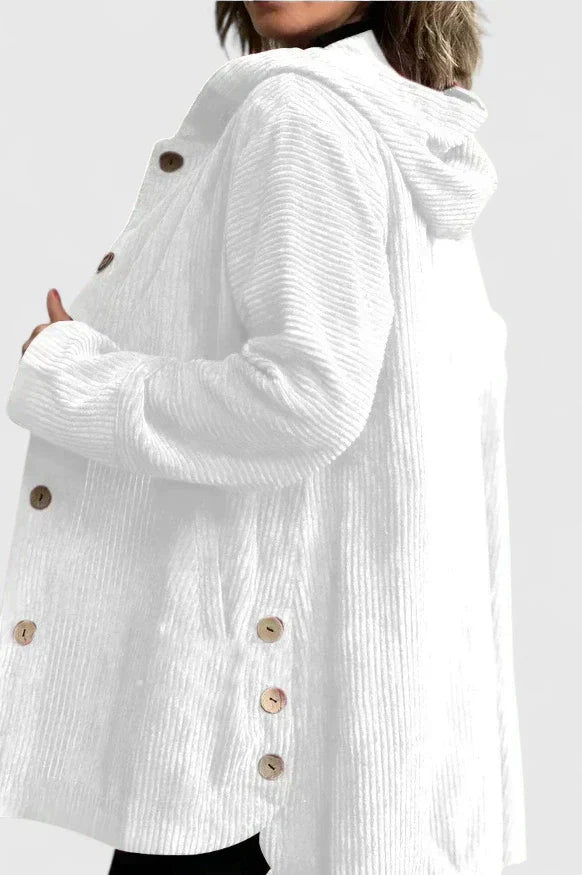 Detail shot: texture of women's comfortable hooded jacket. Everyday style casual outerwear, autumn/winter.