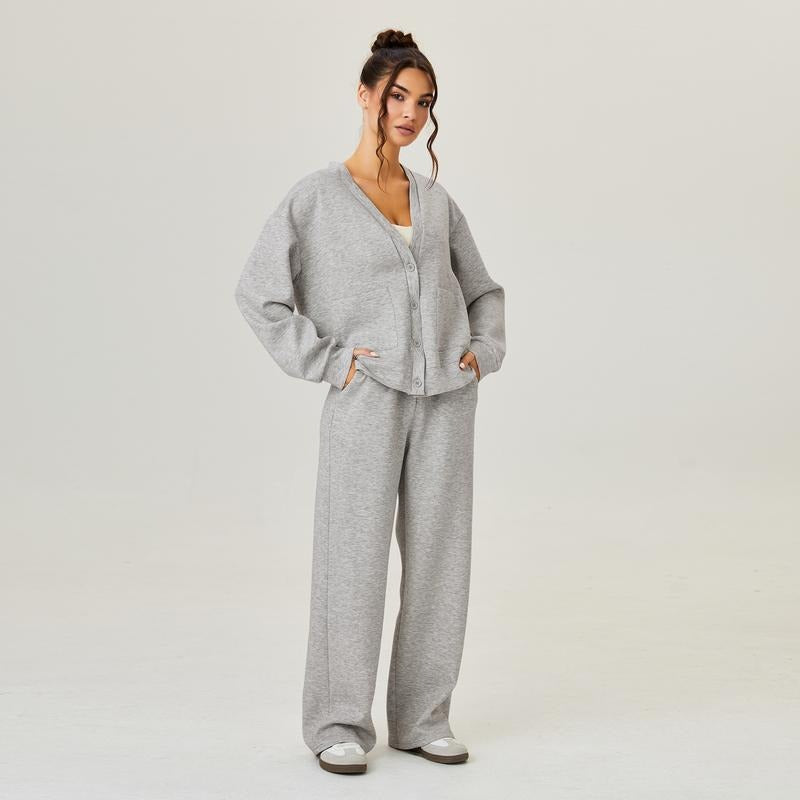 Women's comfortable knit lounge set, featuring a soft cardigan & relaxed fit trousers in a modern gray.